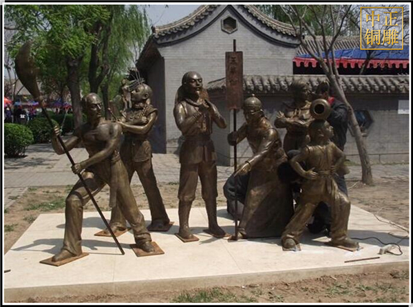 街頭賣藝人物銅雕塑.jpg